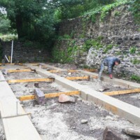 Levelling off the concrete.