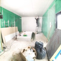 Fitting the plasterboard.